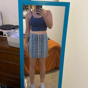 A cute skirt with blue, white, pink, and some yellow